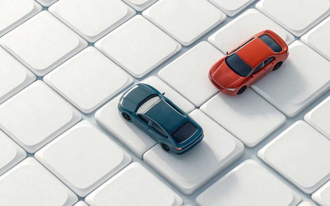 Two cars on a keyboard representing a car accident checklist.